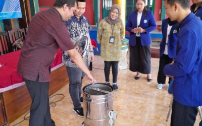 Penerapan Mesin Peniris Minyak di Desa Srigonco: Meningkatkan Kapasitas dan Kualitas Produksi UMKM Kacang Telur
